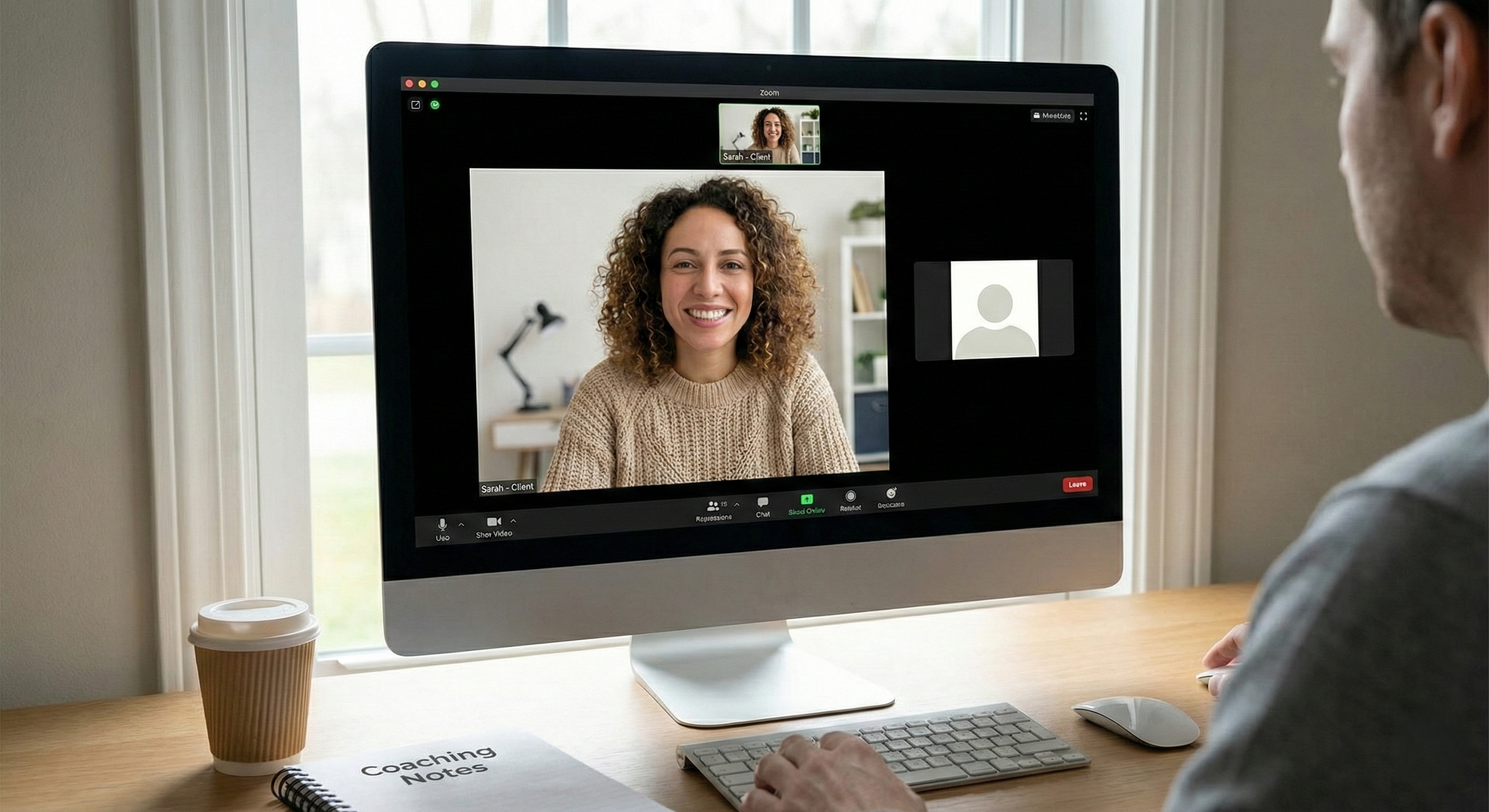 Man and woman having an online coaching session on a video call